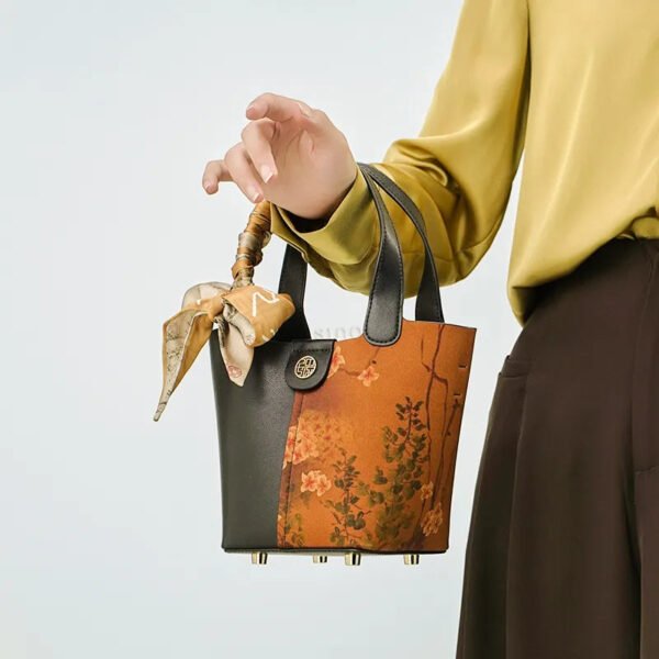 model-arm-carry-plum-blossom-handbag-front model-arm-carry-plum-blossom-handbag-front
