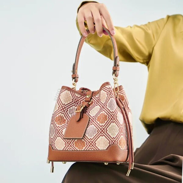 model-seated-brocade-bucket-bag-on-knees model-seated-brocade-bucket-bag-on-knees