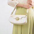 model-wearing-octagonal-brocade-bag-crossbody
