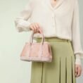 song-brocade-pink-dingsheng-crossbody-bag-model-green-dress-handheld